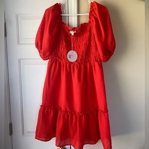 Short red dress with large sleeves